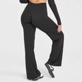 NUVR FLOW PANTS - Straight Leg Pants - Black